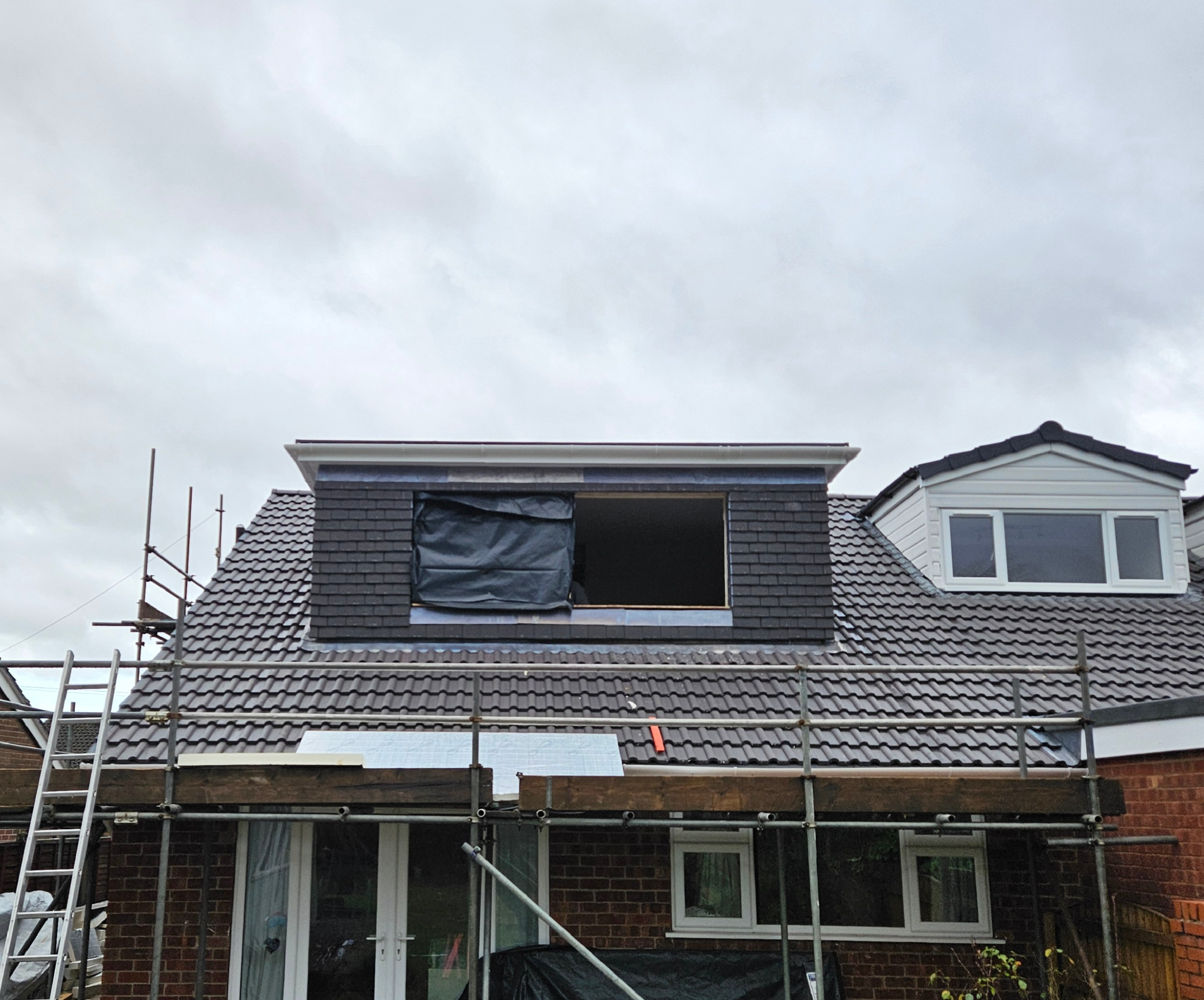 Rear dormer loft conversion exterior in Poynton