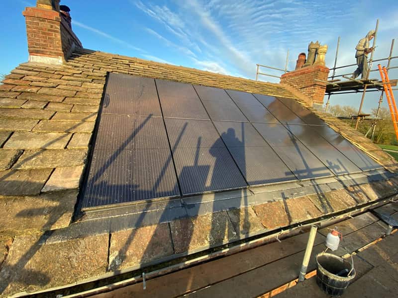 Reclaimed natural stone re-roof on a period Marple property by Daniel Scott Roofing