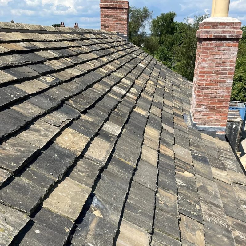 Natural stone and slate roof on a period property in Wilmslow