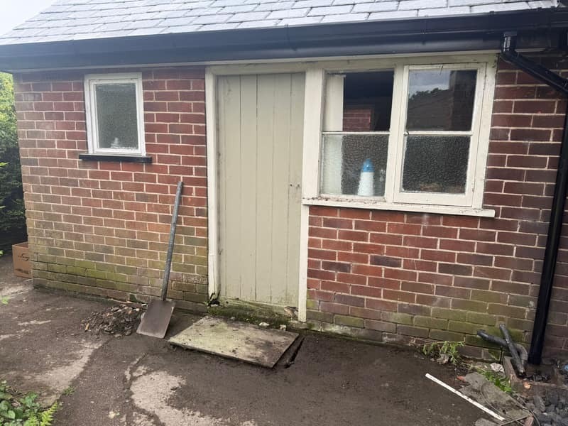 New black uPVC fascia, soffit and half-round guttering fitted along the eaves of an Adlington property