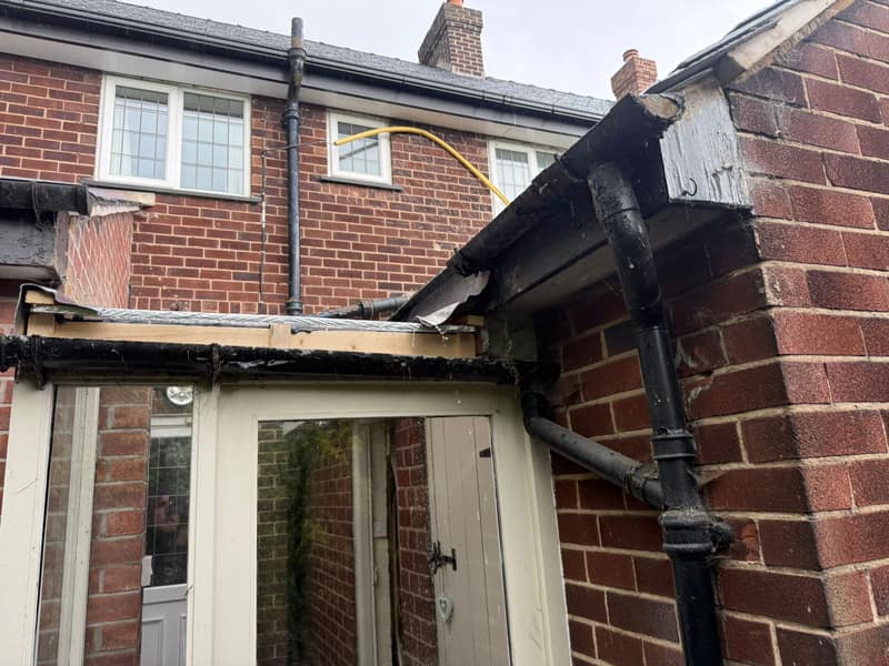 Adlington roofline stripped back to fresh timber, old fascia boards and cast iron guttering removed ready for new uPVC