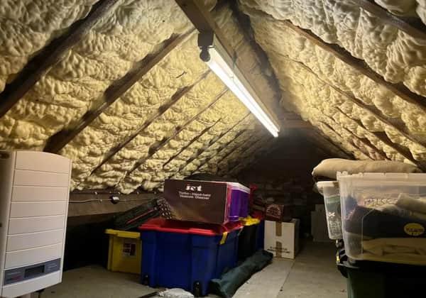 Spray foam insulation between the rafters on the underside of a domestic loft roof
